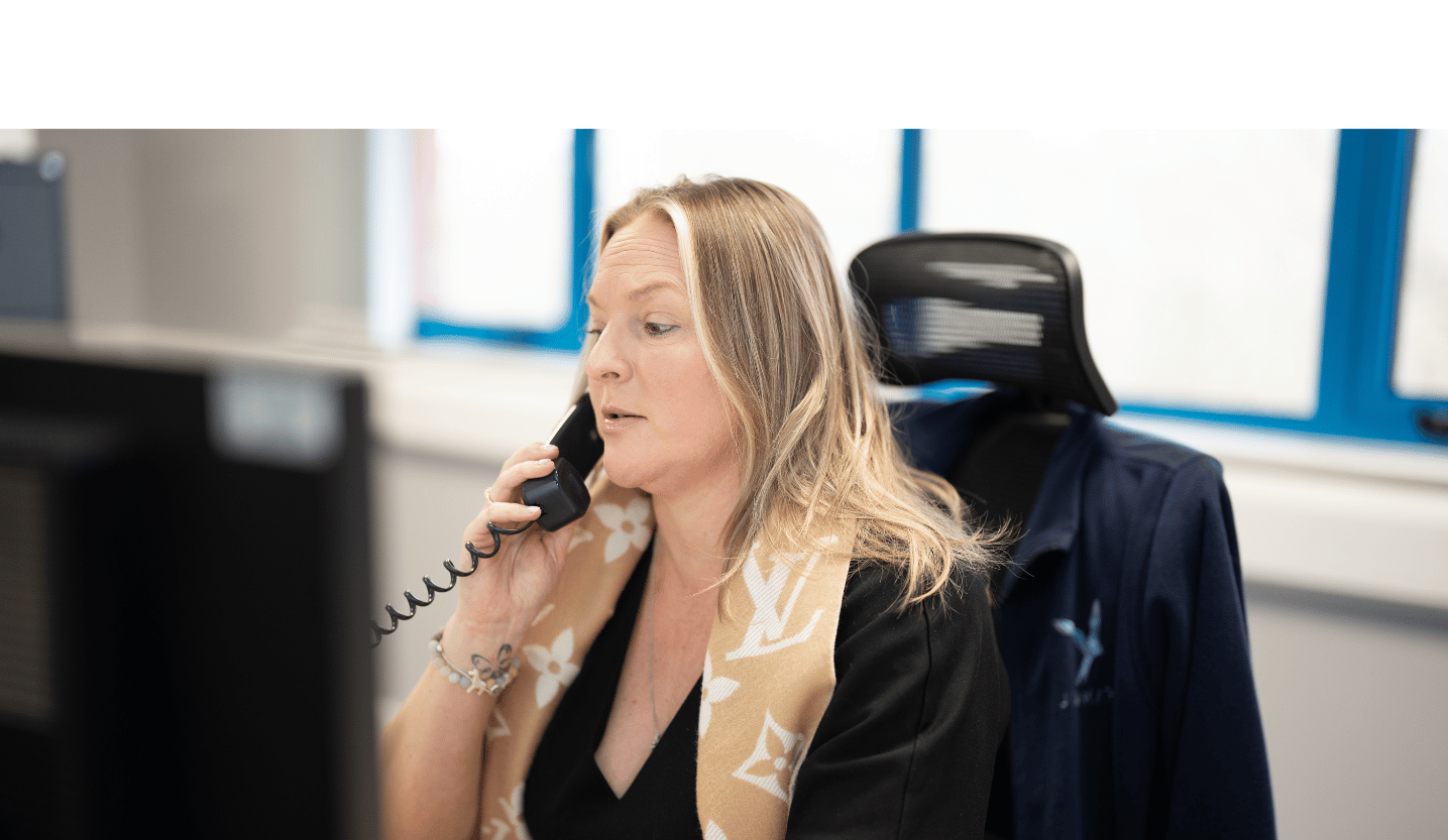 Jenkar Director Karen Phillips talking to a customer over the phone