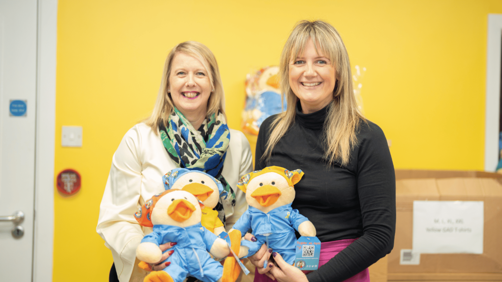 Give a Duck employees holding a Chemoduck