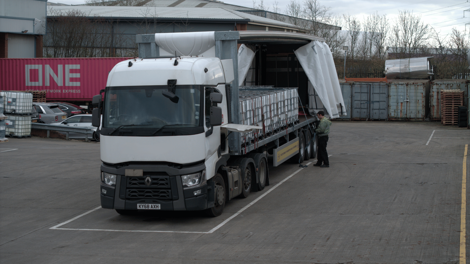 Truck getting unloaded in the Jenkar yard