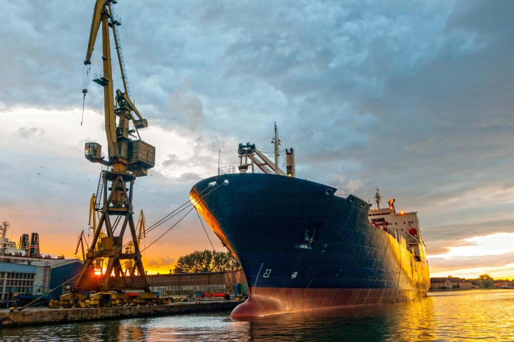 Cargo ship stationary at a shipping port