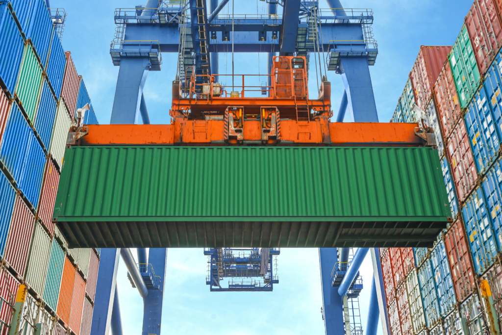 Container being moved around in shipping yard