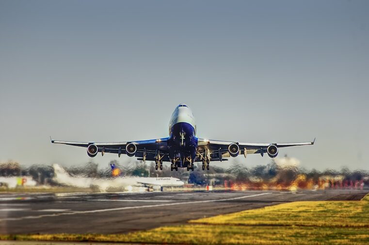 An image of an airplane taking off on the runway