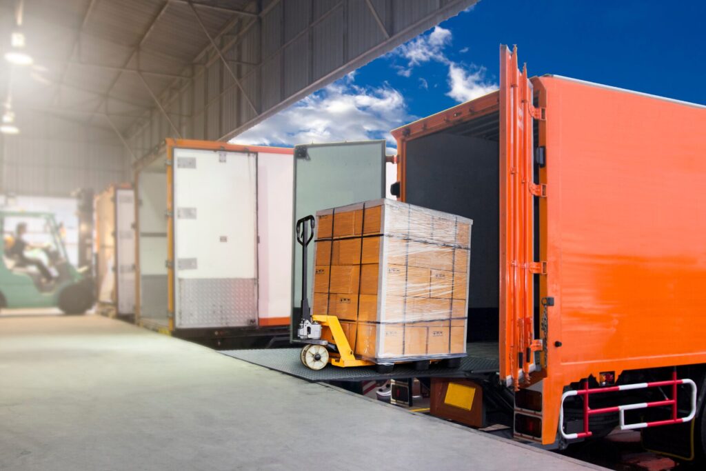 cargo being loaded from warehouse into a lorry.