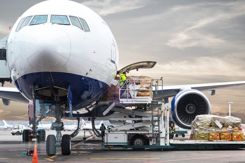 cargo being loaded onto a plane before 