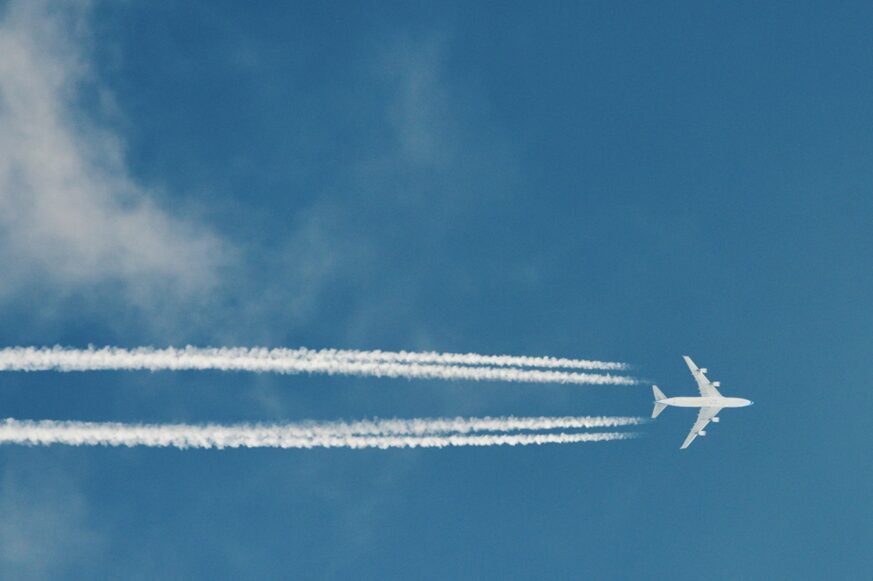 Airplane flying across the sky